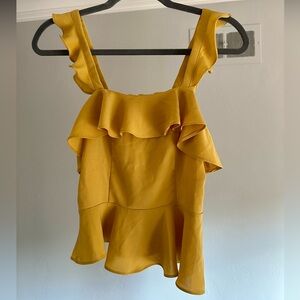 Chriselle x J.O.A. Asymmetrical Peplum Ruffle Top in Mustard Yellow